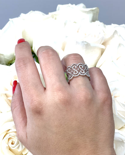 Wide 18K White Gold Ring with Repeating "S" Motif with Round Diamonds
