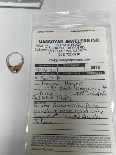 Repair: Silver Swarovski ring, add rose gold plating on top half of ring, polish, leave shank silver