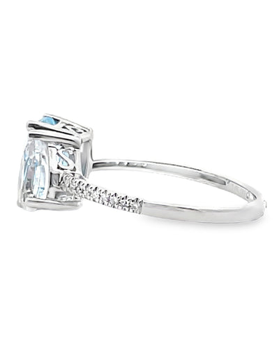 14K White Gold Ring with 2.05 Carat Blue Topaz and 0.90 Carat Pear Shaped White Topaz and Round Diamonds