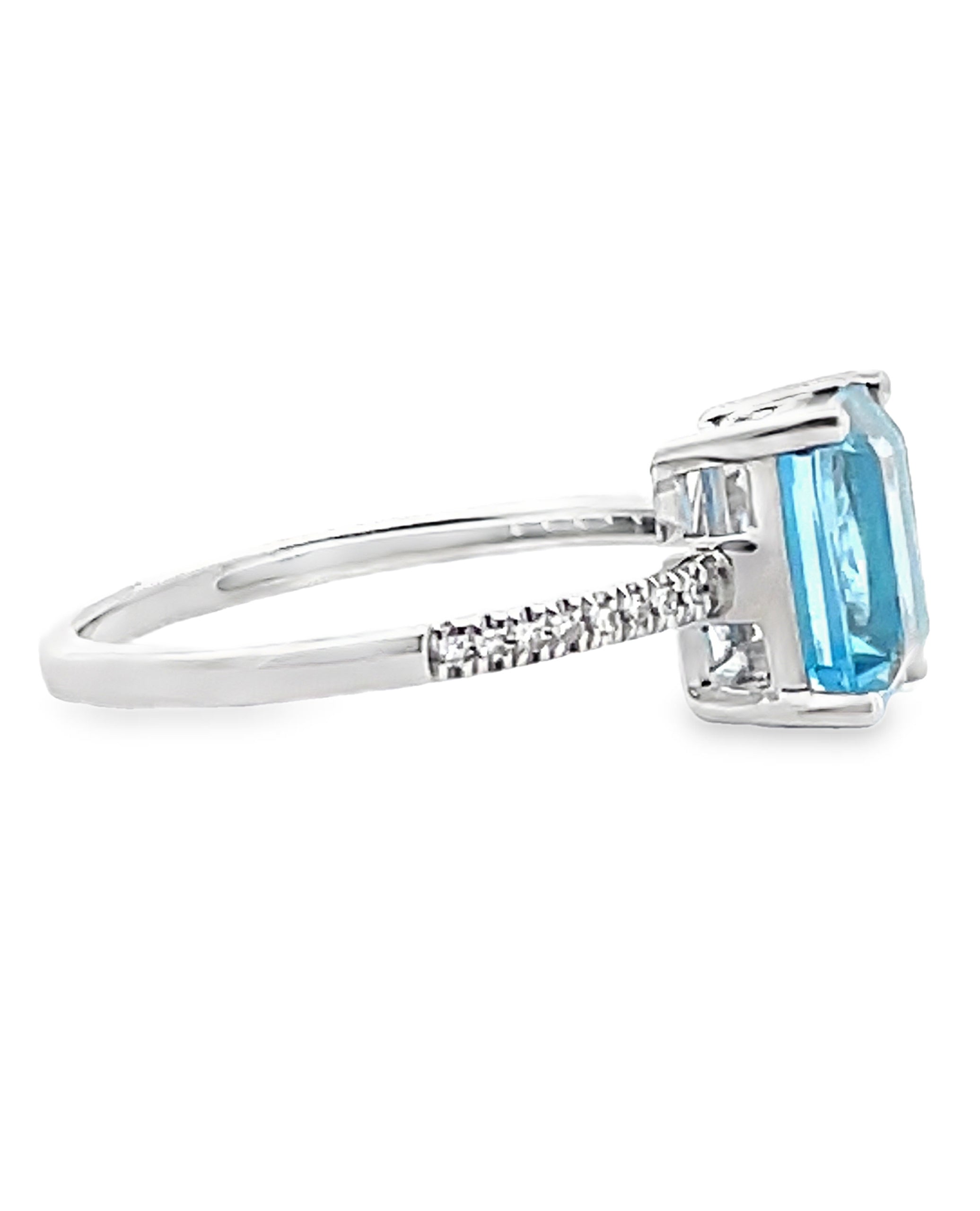 14K White Gold Ring with 2.05 Carat Blue Topaz and 0.90 Carat Pear Shaped White Topaz and Round Diamonds
