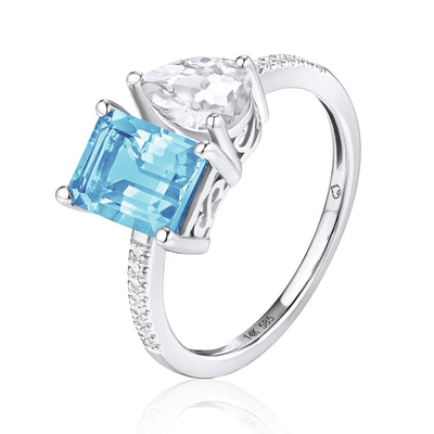 14K White Gold Ring with 2.05 Carat Blue Topaz and 0.90 Carat Pear Shaped White Topaz and Round Diamonds