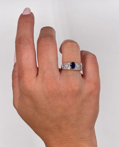 Antique Inspired Platinum Ring with Oval Sapphire & Round Diamonds