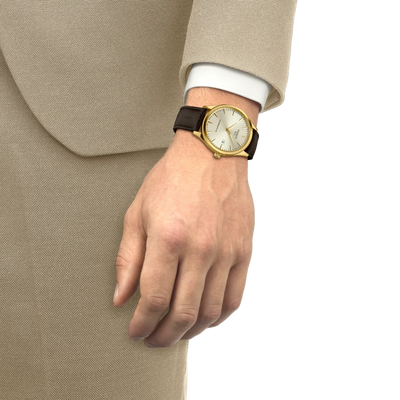 Tissot T158.407.36.261.00 Classic Dream Gold Color 40mm Watch with Swiss Automatic Movement