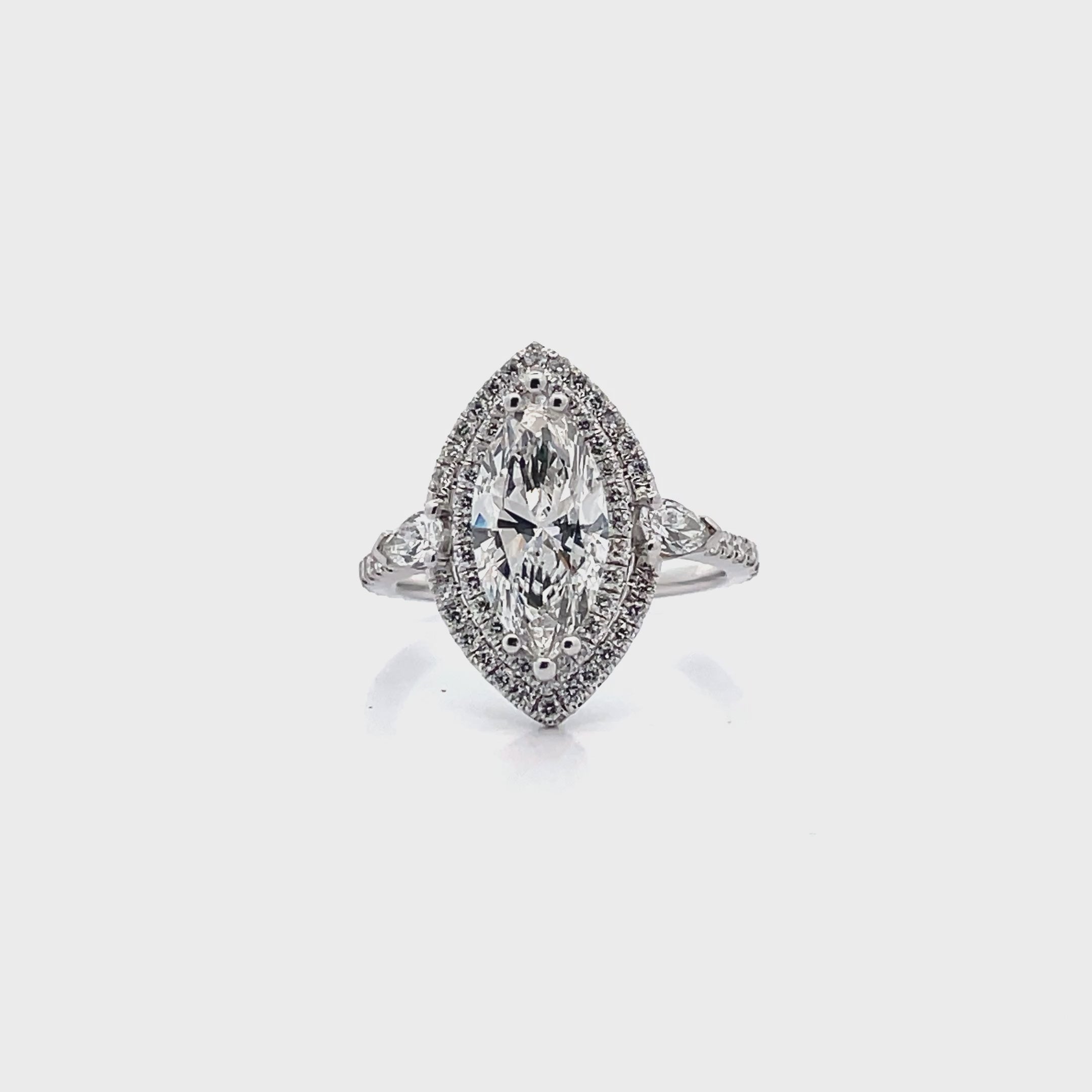 Load video: 18K White Gold Diamond Ring with Lab Grown Marquise Center