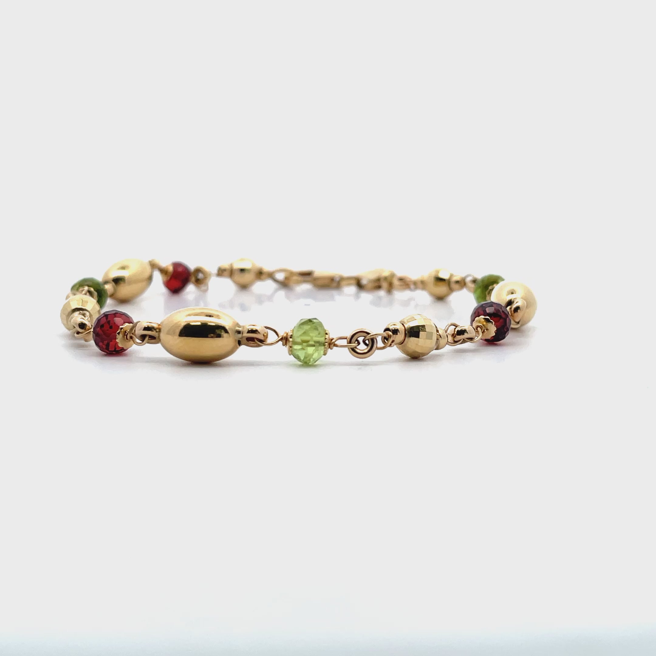 Indlæs video: 14K Yellow Gold Leslie's Bracelet with Garnet &amp; Peridot