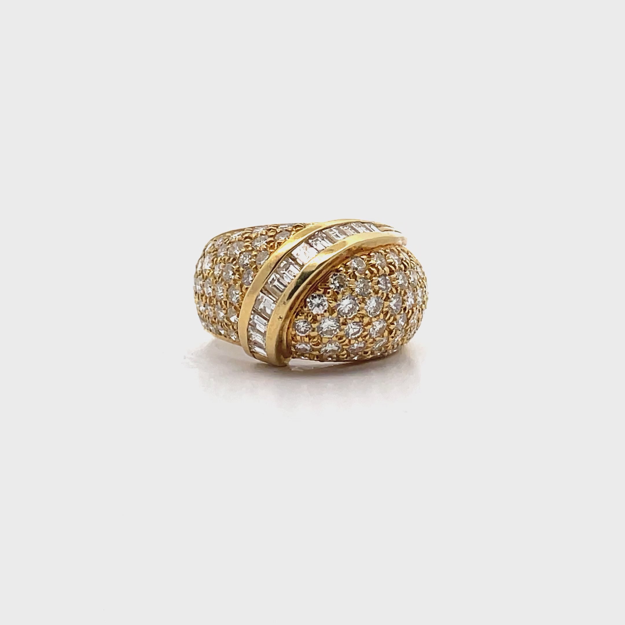 Load video: Vintage Dome Ring with Round and Baguette Diamonds 2.65 Carats in 18K Yellow Gold