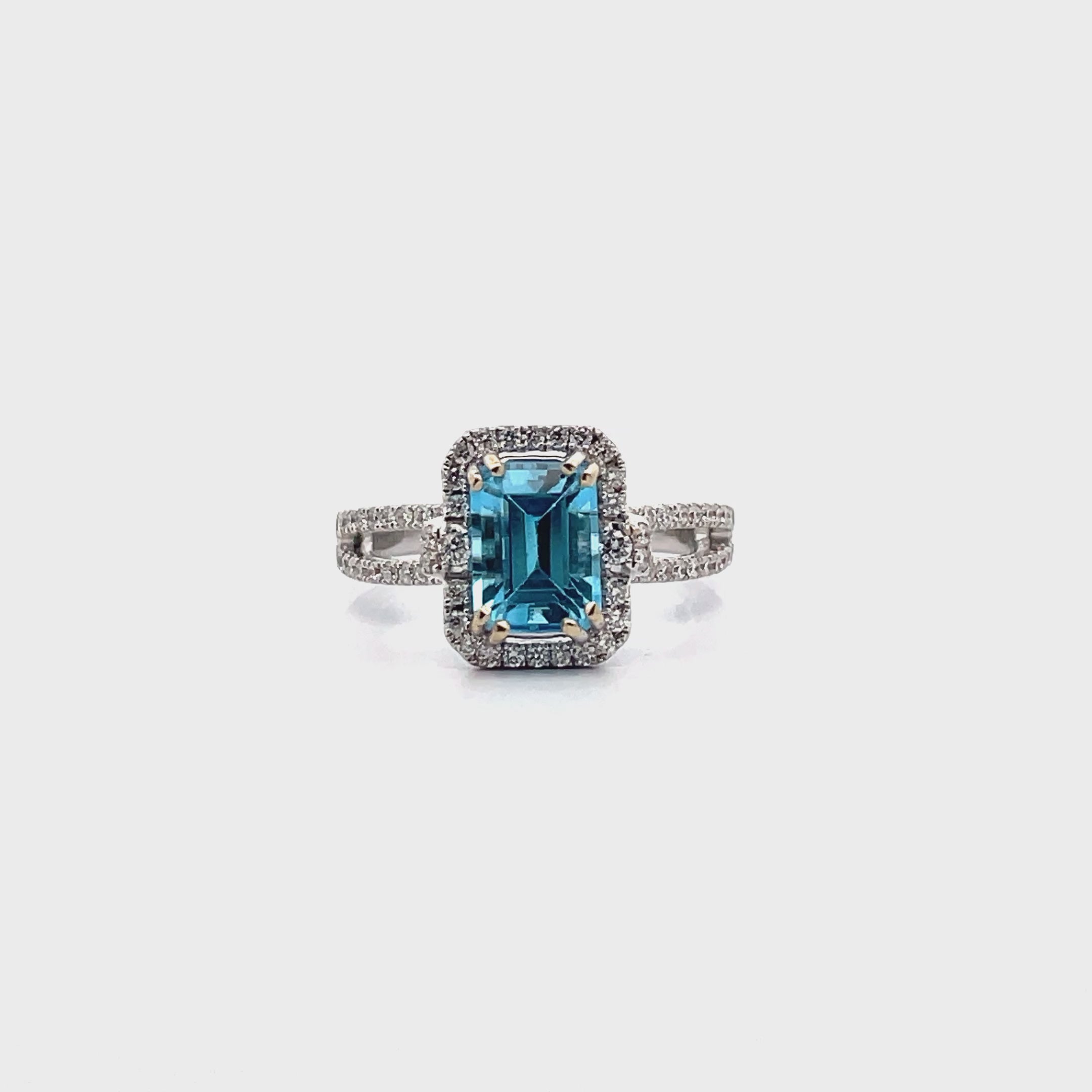 Load video: Vanna K 18RO51811DCZ Diamond Ring with One Emerald Cut 8X6 Millimeter Swiss Blue Topaz