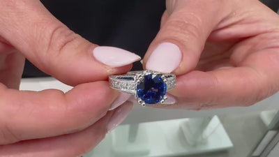 Round Sapphire in Platinum Ring with Diamonds and Hand Engraving