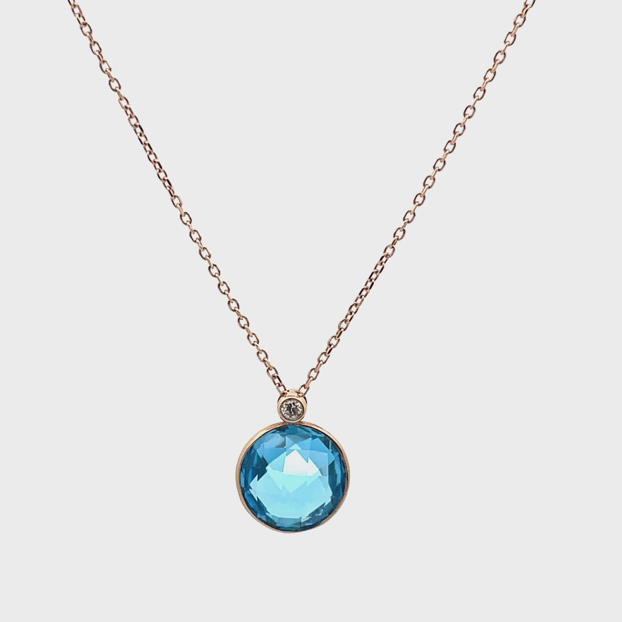 Load video: Olivia B. 14K Yellow Gold Swiss Blue Topaz "Snowman" Necklace