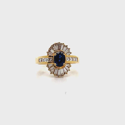 Vintage Oval 0.77 Carat Sapphire Ring with Baguette and Princess Cut Diamonds Set in 18K Gold