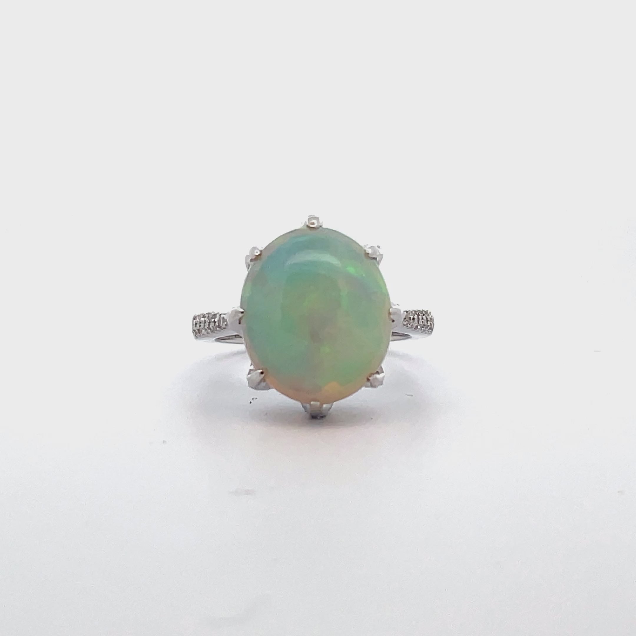 Oval Shaped Opal Ring Prong Set in 14K White Gold