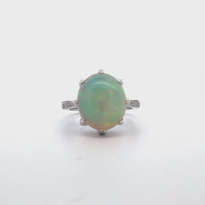 Oval Shaped Opal Ring Prong Set in 14K White Gold