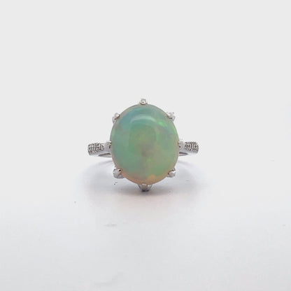 Oval Shaped Opal Ring Prong Set in 14K White Gold