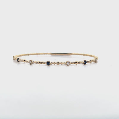 14K Yellow Gold Seven Station 0.13 Carat Sapphire, 0.12 Carat Diamond Flexible Bangle Bracelet