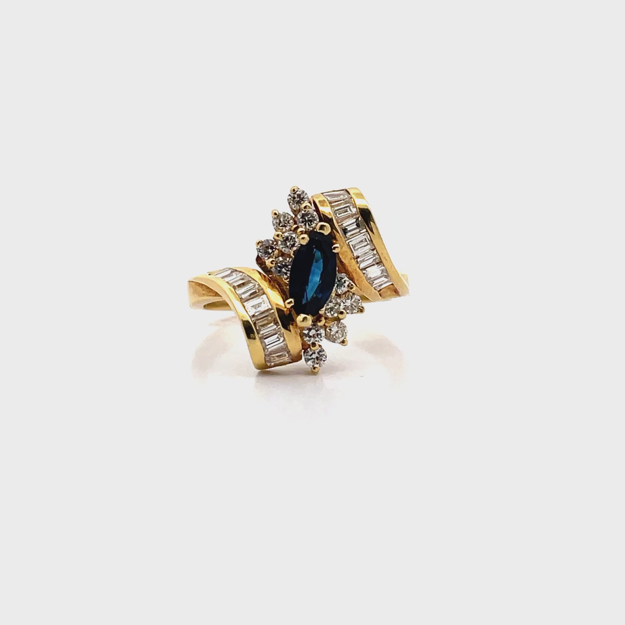 Vintage 0.80 Carat Marquise Sapphire Ring with Bageutte and Round Diamonds 1.10 Carats in 18K Yellow Gold