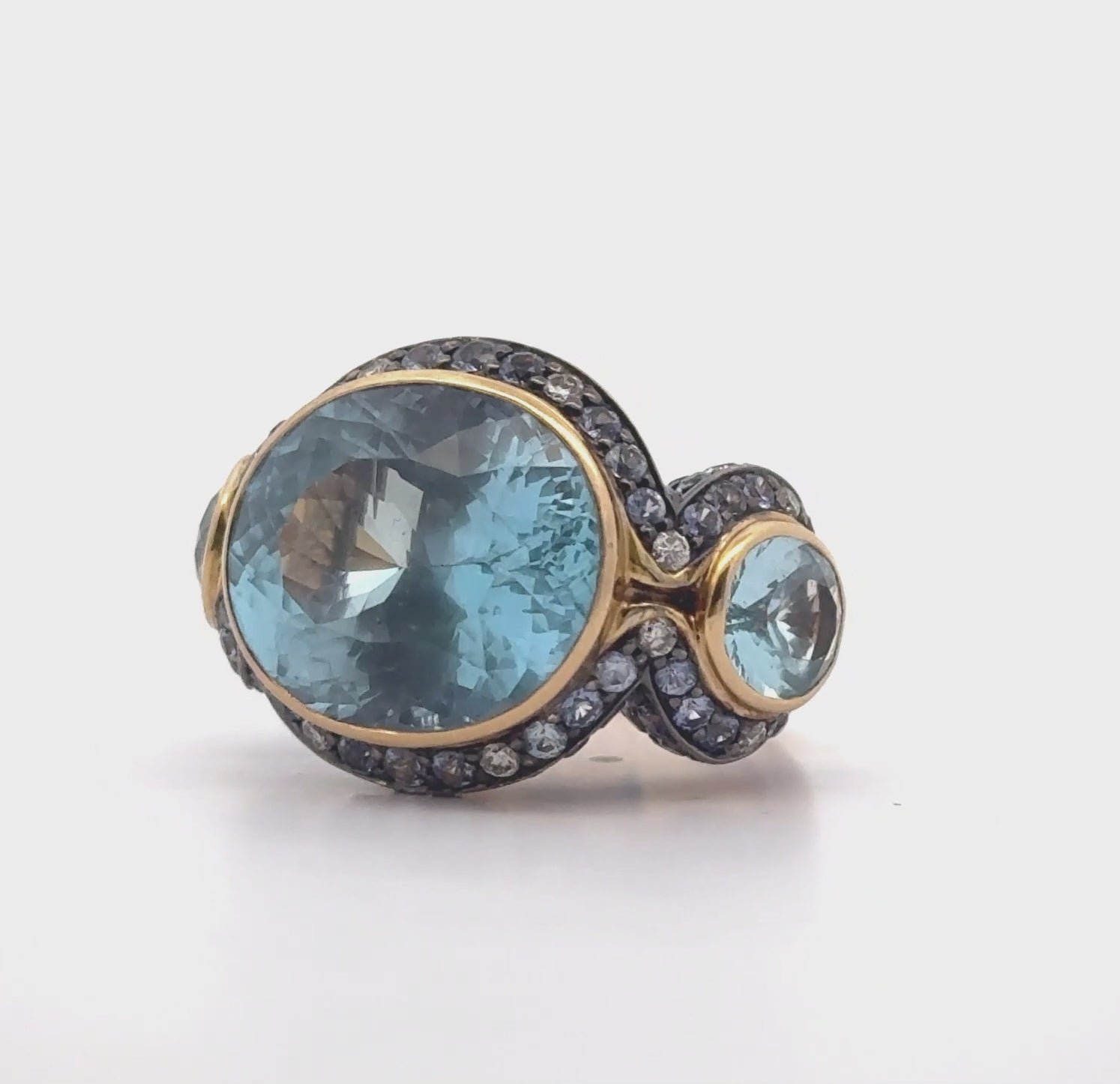 Load video: Large 18k Rose Gold Oval Blue Topaz Three Stone Ring with Sapphires &amp; Diamonds