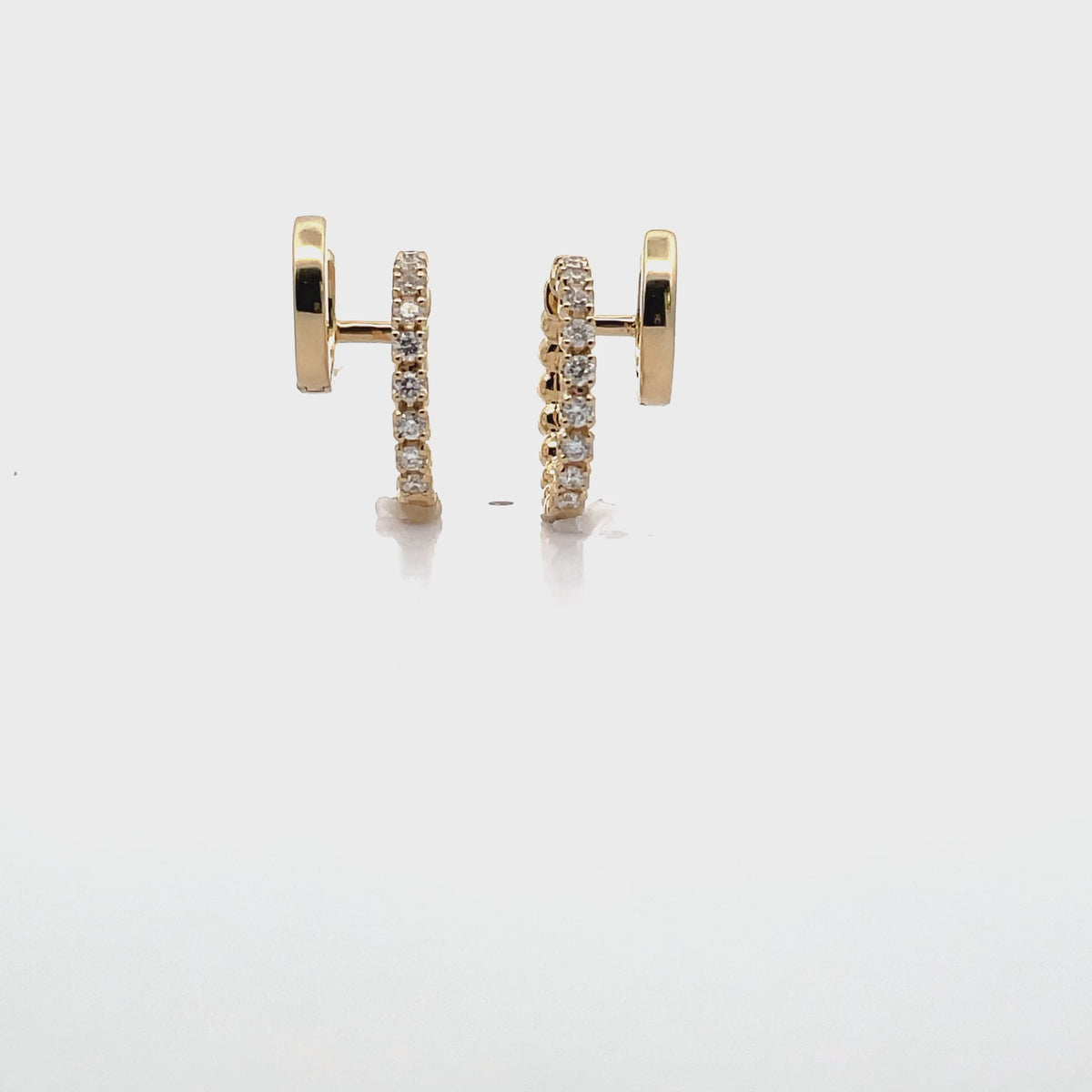14K Yellow Gold Double Hoop Earrings With Hinged Snap Back Closures And Round Diamonds Totaling 0.39 Carats