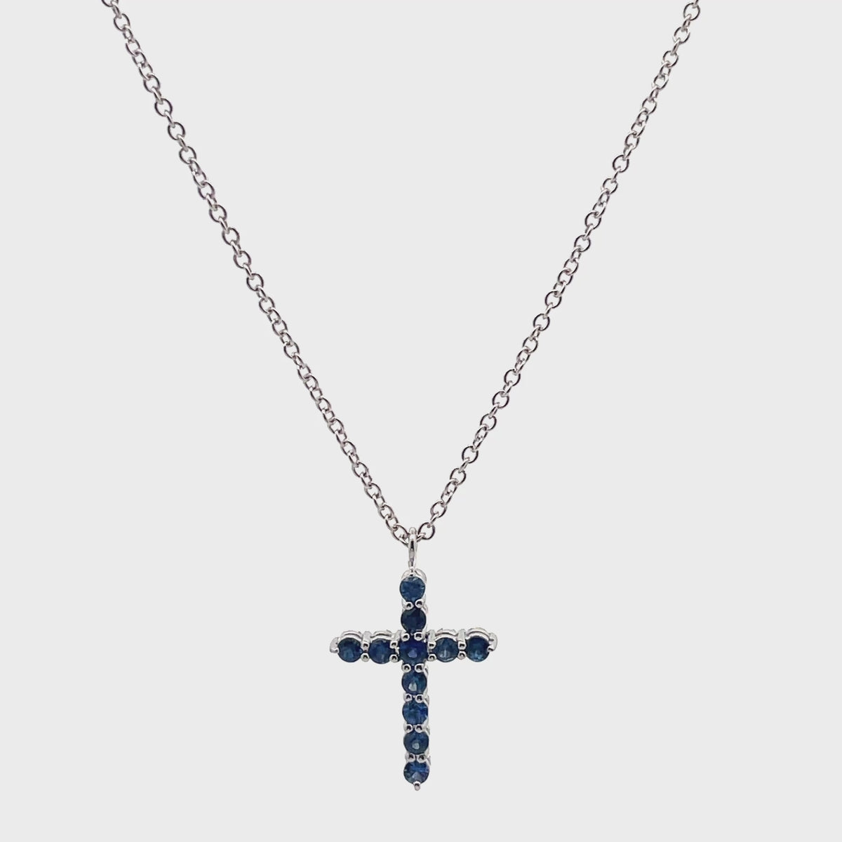 Load video: 18K White Gold Reversible Blue Sapphire &amp; Diamond Cross Pendant Necklace