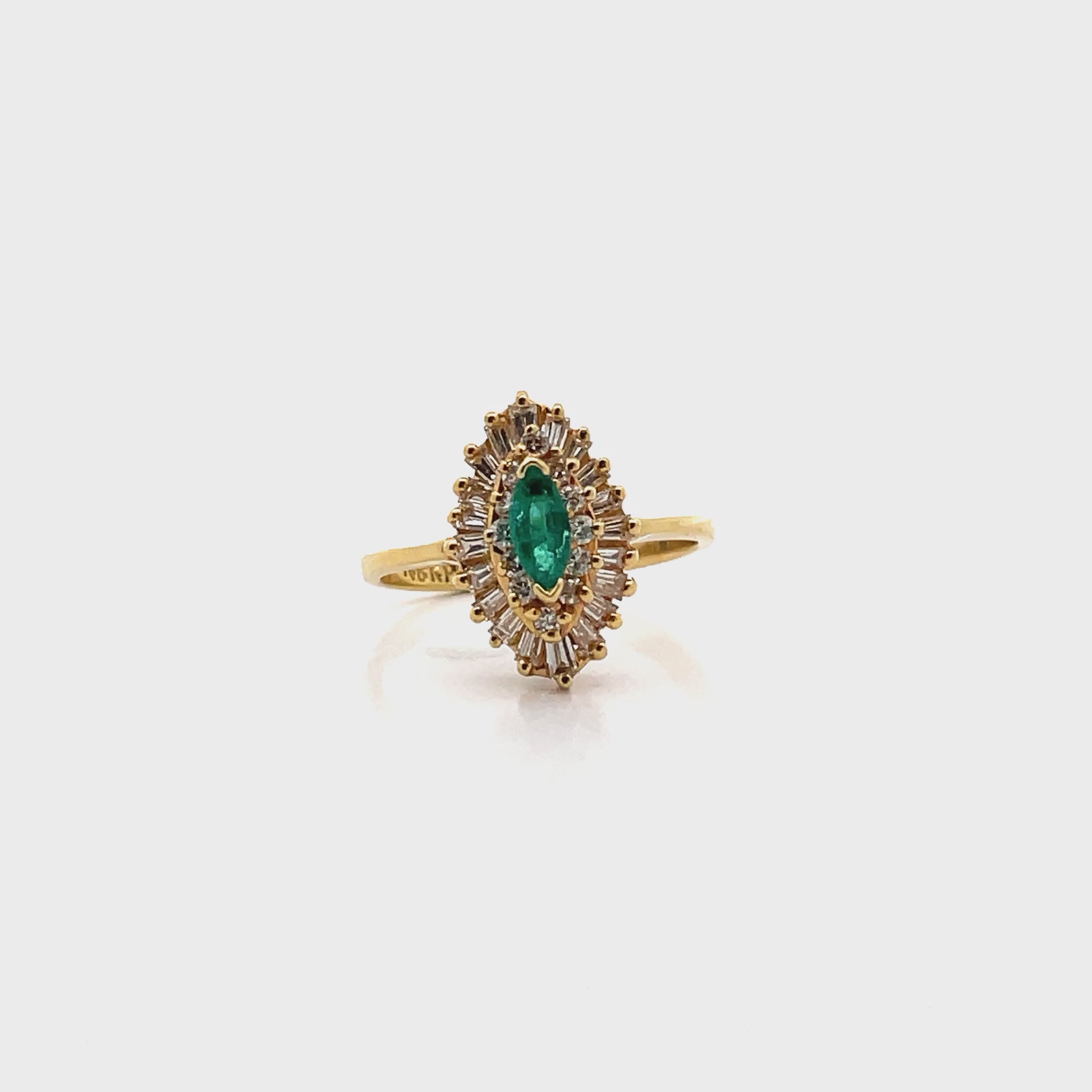 Load video: Vintage Marquise 0.30 Carat Emerald in 18K Yellow Gold Cocktail Ballerina Ring with 0.68 Carat Double Halo Diamonds