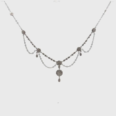 Pre-Owned Vintage 14K White Gold Festoon Necklace with Floral Motif Stations and Approximately 1.00 Carats of Single-Cut and Old-Cut Diamonds