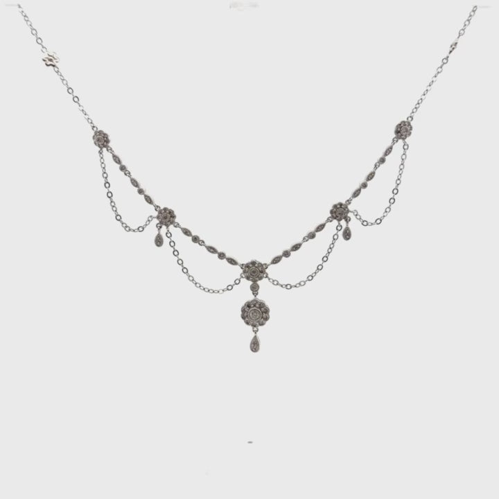 Pre-Owned Vintage 14K White Gold Festoon Necklace with Floral Motif Stations and Approximately 1.00 Carats of Single-Cut and Old-Cut Diamonds