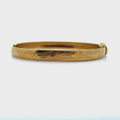 Pre-owned Vintage 18K Yellow Gold Hinged Bangle Bracelet with Safety Clasp and Floral Elongated Engraved Detail