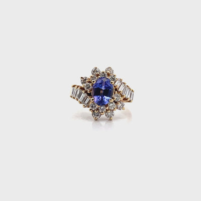 Vintage Oval Tanzanite Ring with Round and Baguette Diamonds Set in 14k Gold
