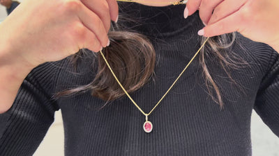 18K Yellow Gold Necklace with Oval Ruby Pendant and Halo Diamonds