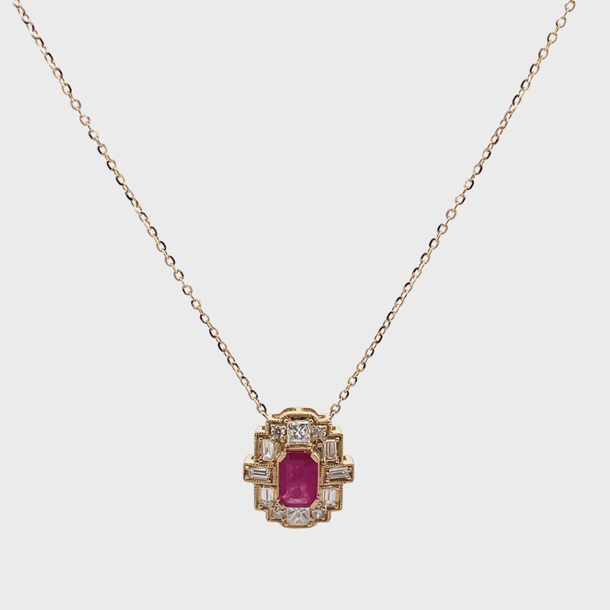 14K Yellow Gold Necklace with Oval Ruby 0.73 Carats, Diamonds Totaling 0.38 Carats, Adjustable Length