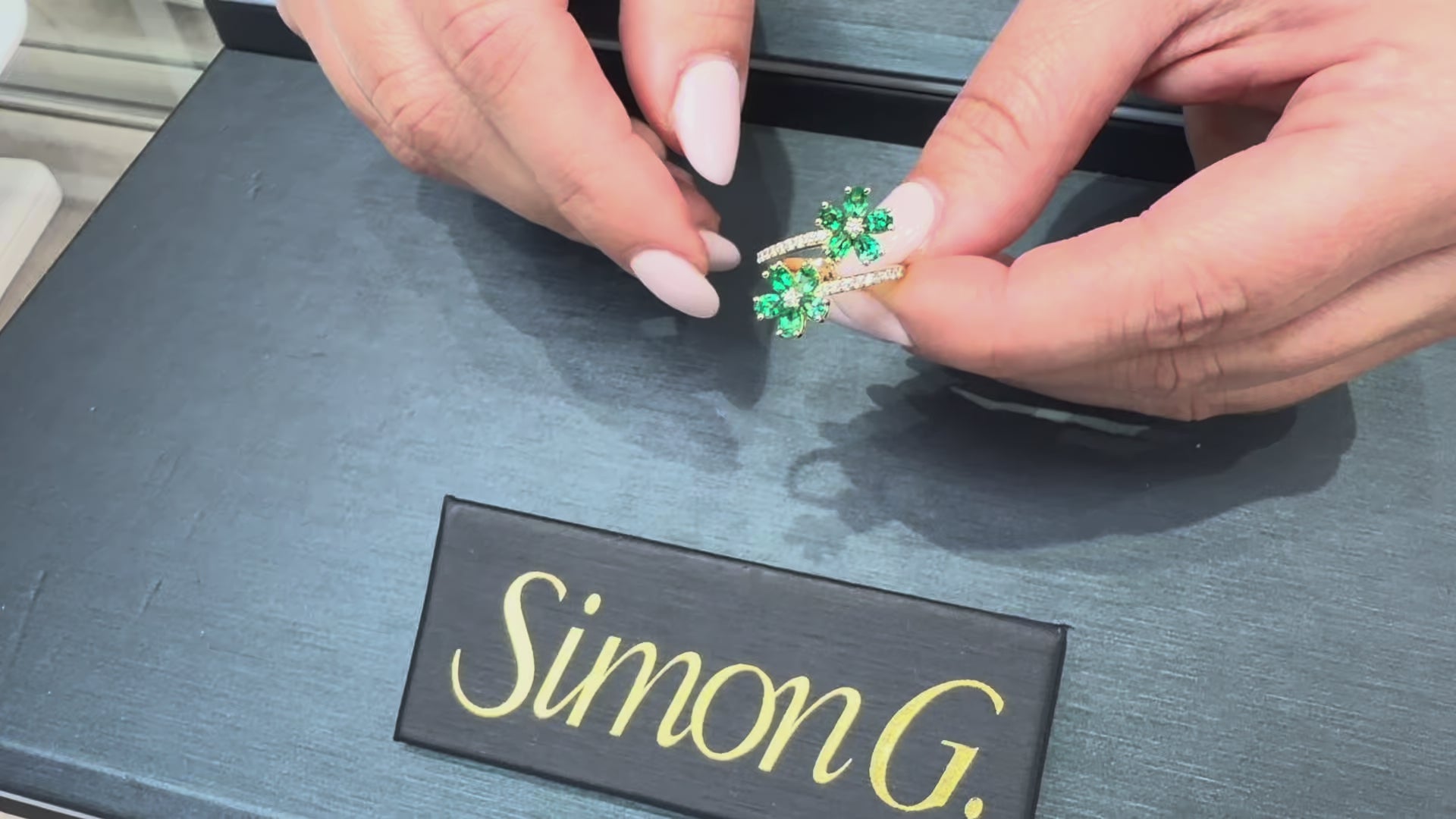 Load video: Simon G. LR4840 18K Yellow Gold Emerald Flower Bypass Ring