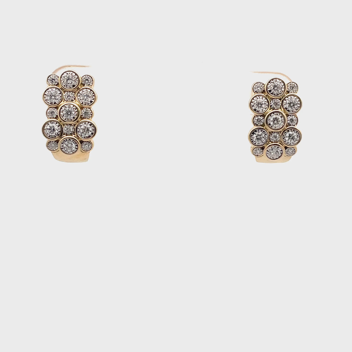 14K Yellow Gold Post Earrings With Pushback Closures With Round Diamonds Totaling 0.56 Carats, Small And Large Staggered Alternating Arrangement
