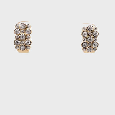 14K Yellow Gold Post Earrings With Pushback Closures With Round Diamonds Totaling 0.56 Carats, Small And Large Staggered Alternating Arrangement