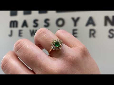 Vintage Oval Emerald Ring with Round and Baguette Diamonds Set in 18K Yellow Gold